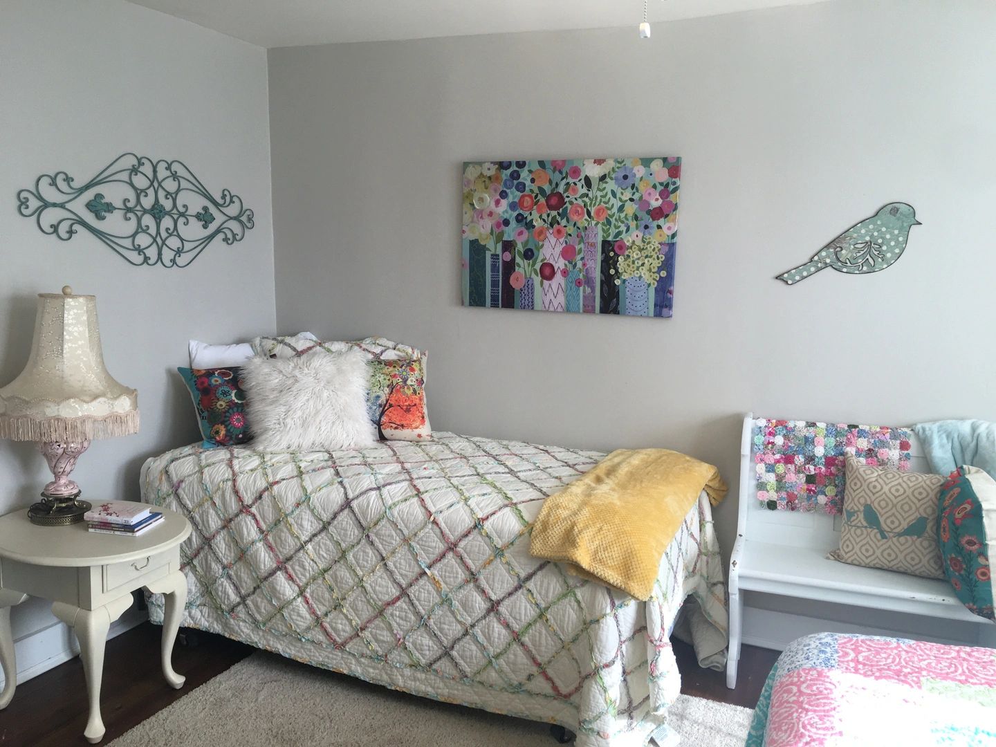Bedroom with floral artwork
