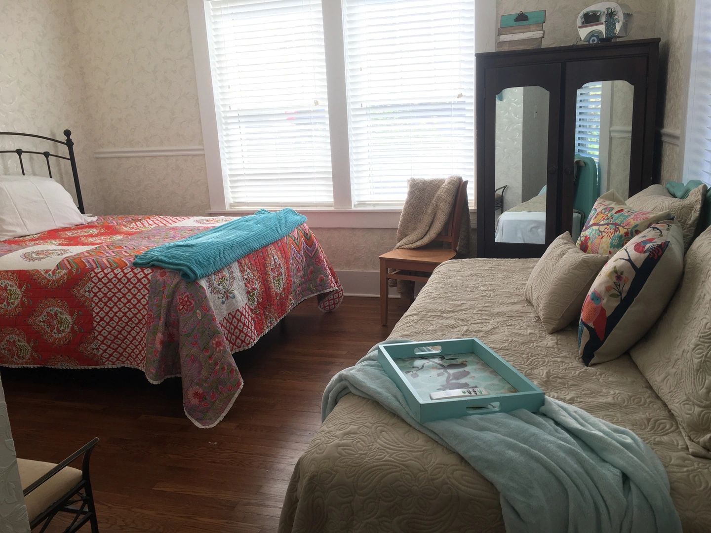 Bedroom with red quilt